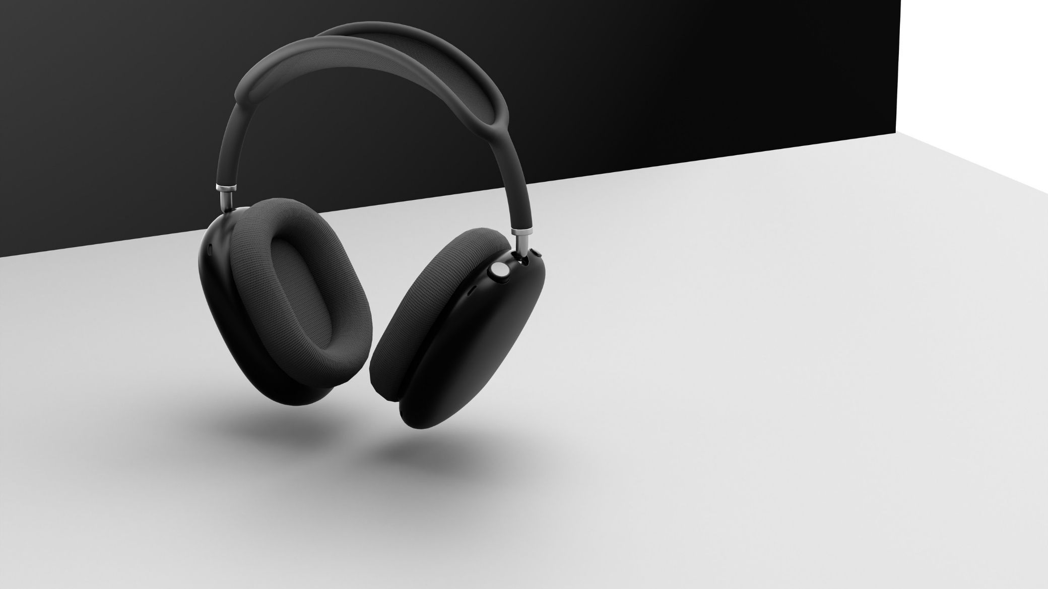 Circum-aural matt svart hörlur med suspension-båge typ AirPods Max, studio vy på svartvit bicolor bakgrund, illustrerande Apples distinkta design i premiumsegmentet för trådlösa hörlurar